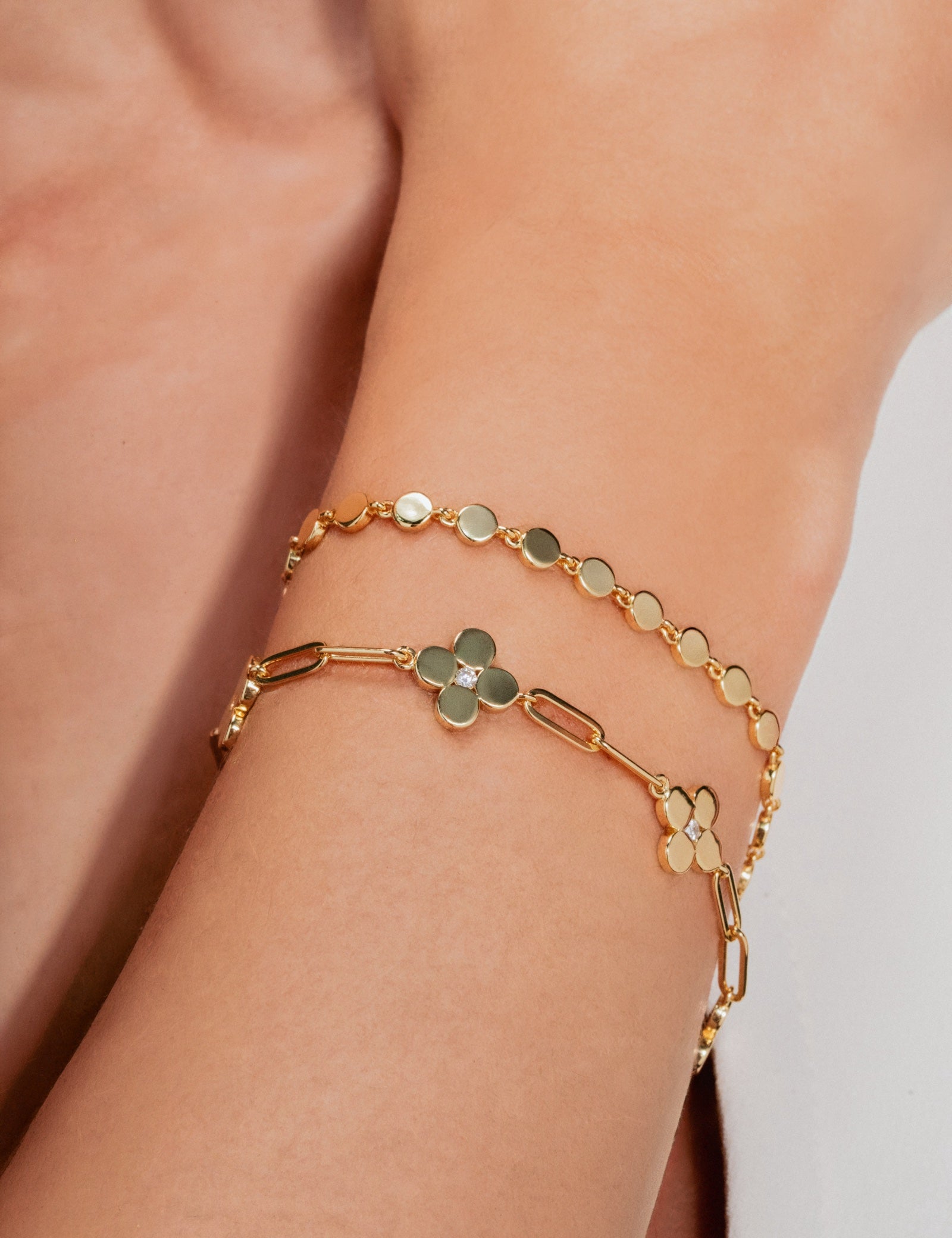 Gold_Dot_and_Flower_Bracelet_Stack_de4dd42a-6297-4f84-b478-a8be7a20a425.jpg